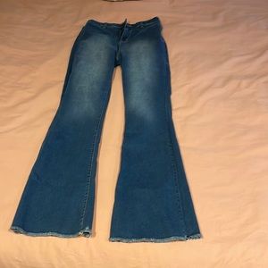 FashionNova medium blue wash flare pants